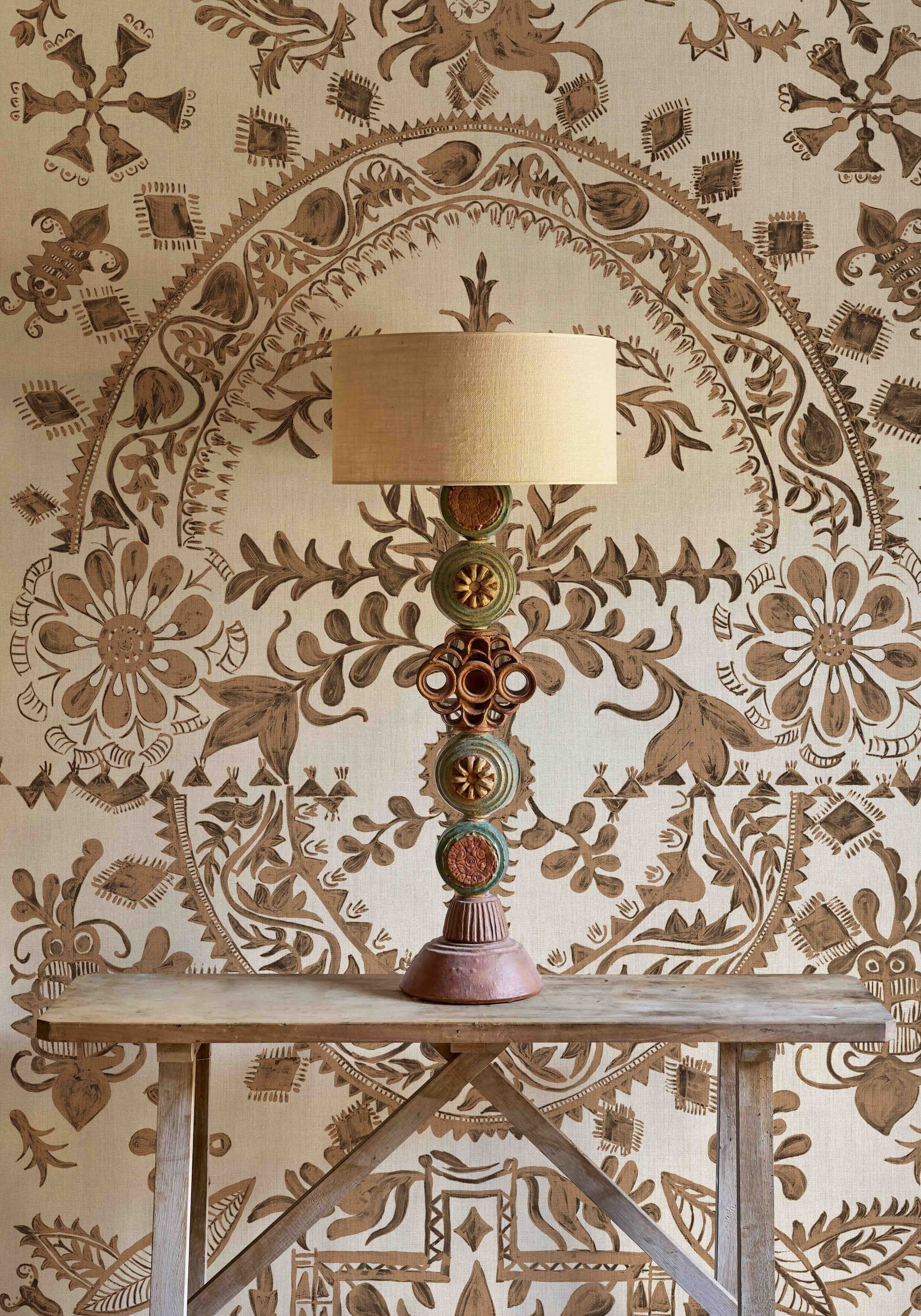 Womad LG 100 Henna wallpaper in room lewis and wood
